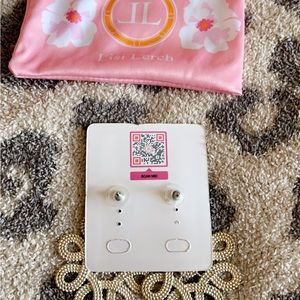 EUC with tags Lisi Lerch earrings